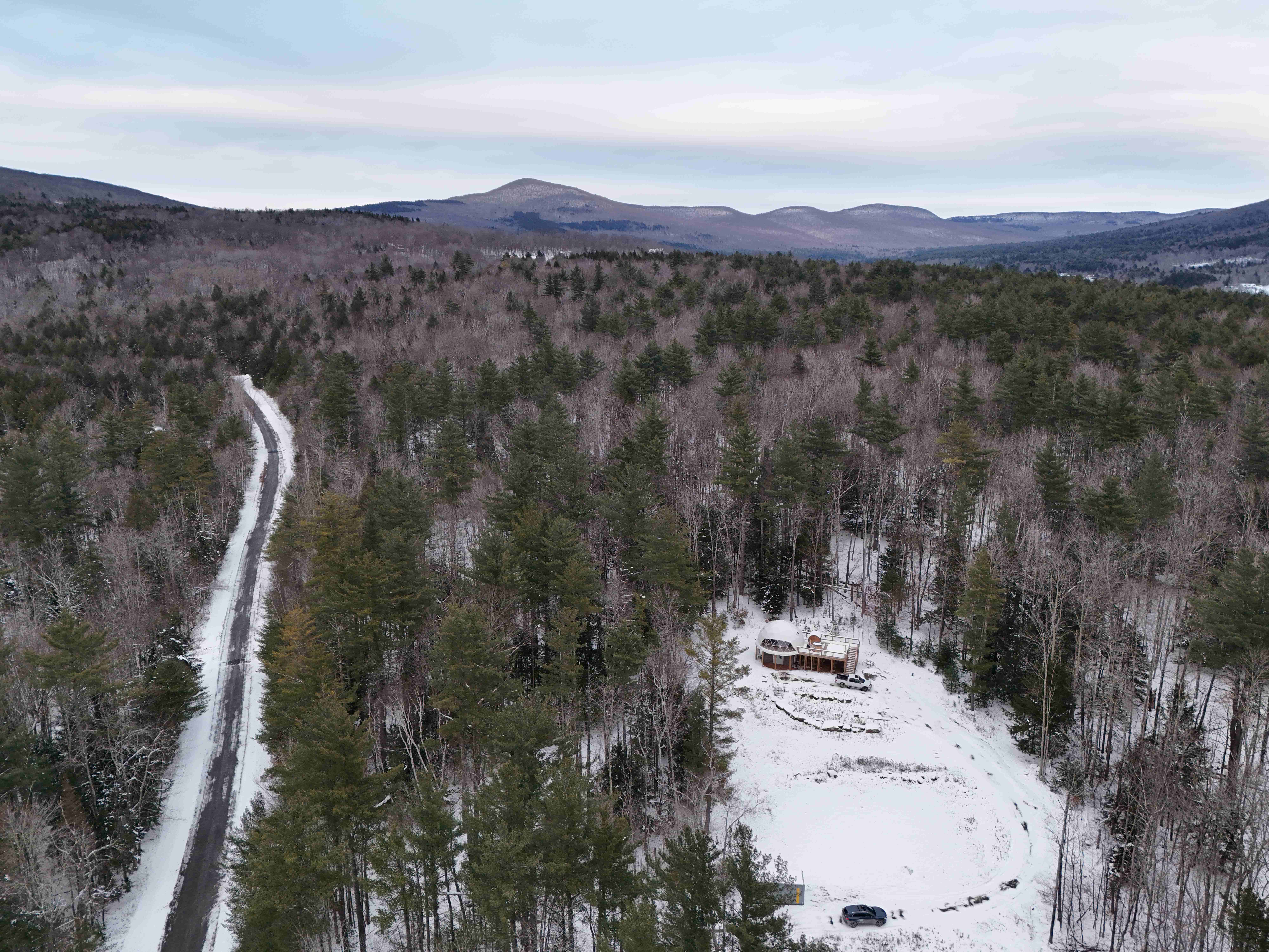 Aerial view of dome property with Catskill Mountains